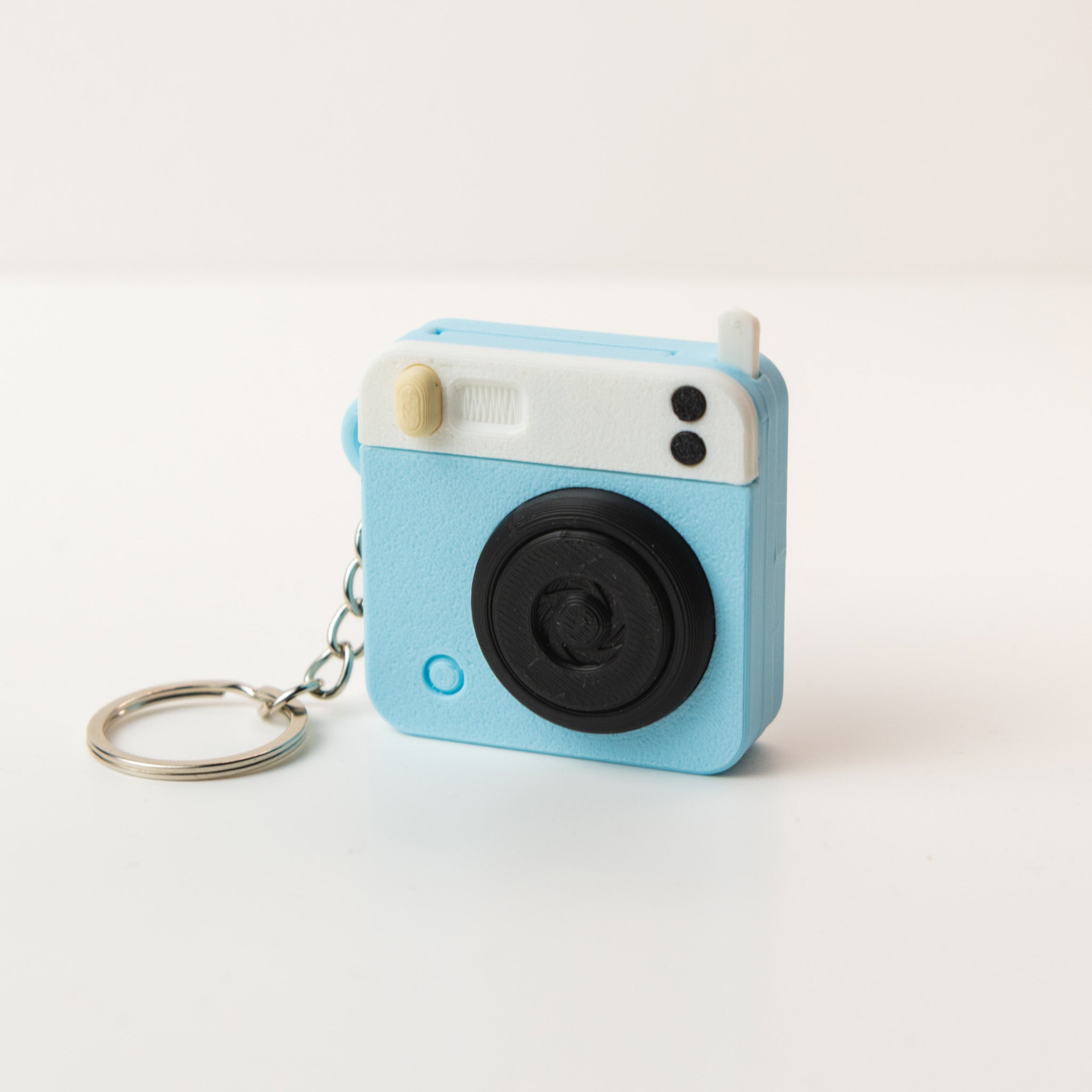 Breloc cameră foto personalizabil – Snap & Pop